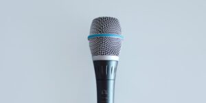 black and gray corded microphone